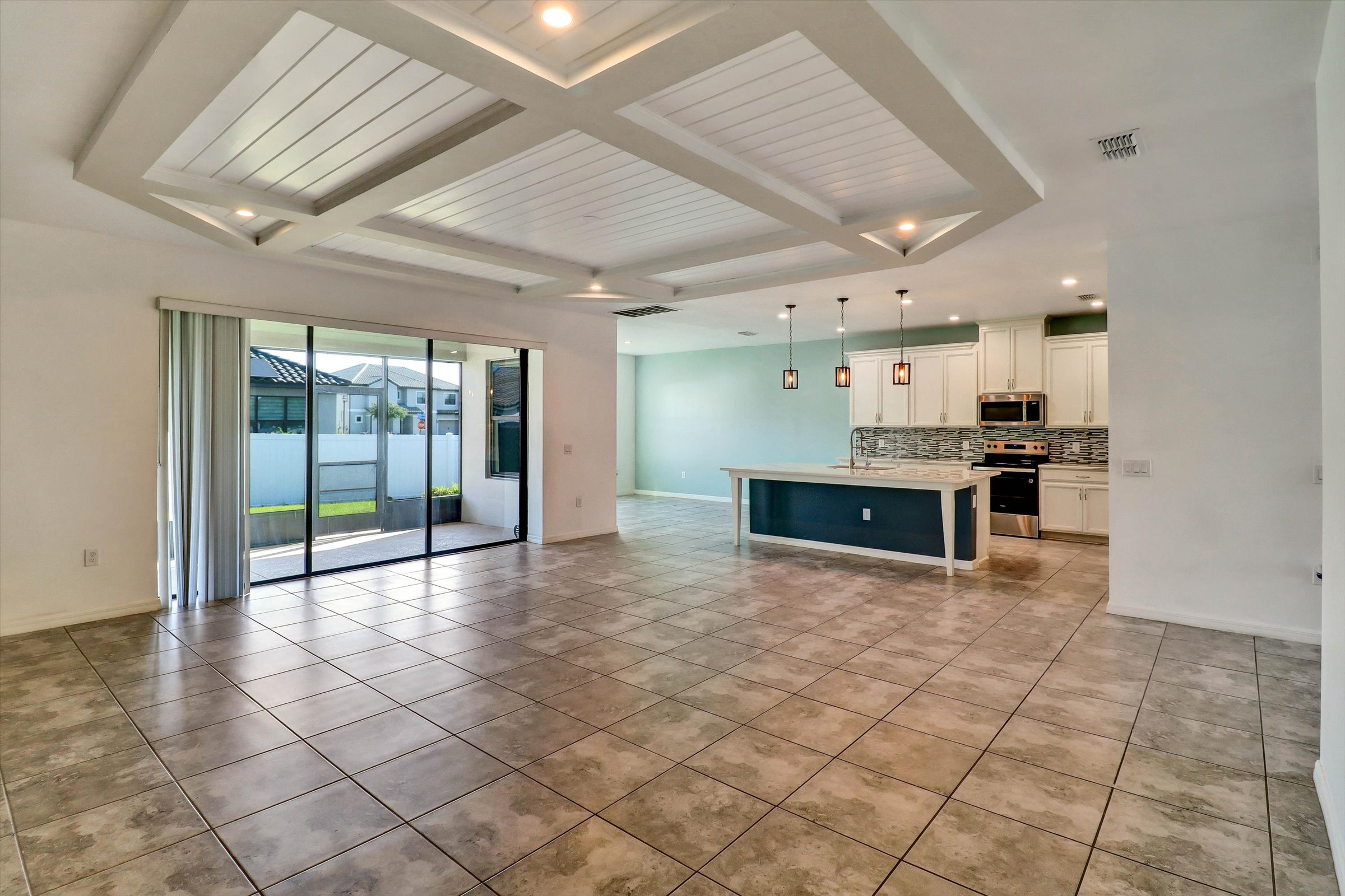 Living Room With Kitchen Visible At 3260 Agostino Terrace